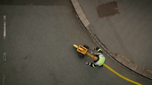 Video Reference: yellow, floor, asphalt, road surface, flooring, adventure, angle, concrete