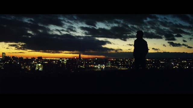 Video Reference: sky, skyline, night, atmosphere, sunset, cloud, dusk, horizon, darkness, city, Person
