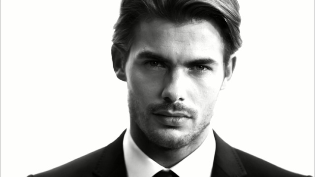 Video Reference: Hair, Face, Forehead, Photograph, Facial expression, Chin, Gentleman, Suit, White-collar worker, Eyebrow, Person