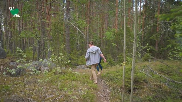 Video Reference: People in nature, Forest, Natural environment, Wilderness, Woodland, Tree, Nature reserve, Biome, Old-growth forest, Grass, Outdoor, Man, Walking, Holding, Wooded, Woman, Wood, Path, Riding, Standing, Field, Area, Country, Trail, Green, Young, Game, Wearing, White, Park, Red, Hill, Street, Dirt, Playing, Clothing, Person, Hiking, Footwear, Plant