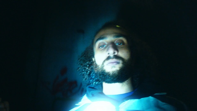 Video Reference: Face, Hair, Facial hair, Blue, Beard, Head, Light, Chin, Forehead, Human, Person