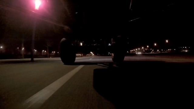 Video Reference: Black, Night, Darkness, Light, Mode of transport, Lighting, Street light, Automotive tire, Automotive lighting, Wheel