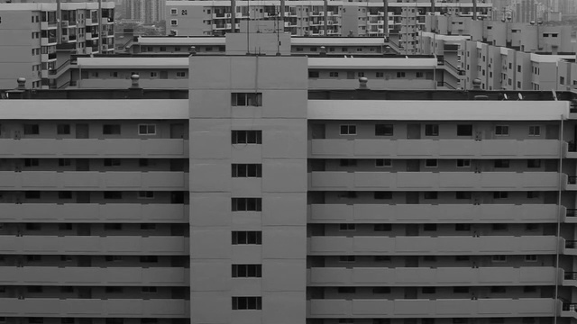 Video Reference: building, tower block, urban area, black and white, metropolis, residential area, metropolitan area, monochrome photography, architecture, skyscraper