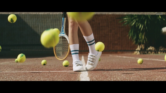 Video Reference: yellow, tennis equipment and supplies, tennis ball, tennis, tennis racket accessory, strings, player, sports, play, racket