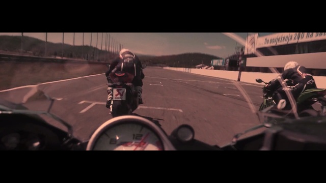 Video Reference: Vehicle, Mode of transport, Motorcycle, Motorcycling, Stunt performer, Photography, Wheel, Automotive tire, Road, Asphalt