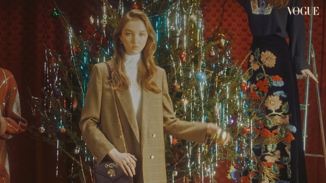 Video Reference: Lady, Fashion, Outerwear, Textile, Temple, Art, Formal wear, Person