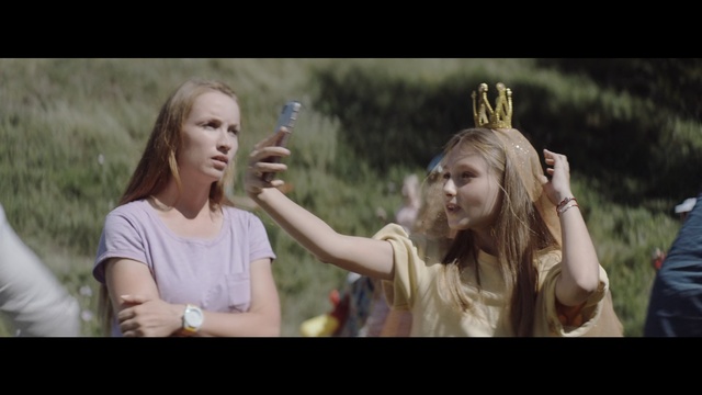 Video Reference: girl, fun, blond, human, screenshot, grass, friendship, scene, smile, Person