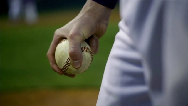 Video Reference: Baseball glove, Hand, Sports equipment, Sport venue, Finger, Ball, Elbow, Baseball, Team sport, Gesture, Person