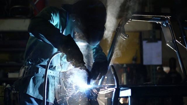 Video Reference: welder, welding, service, darkness, smoke, Person