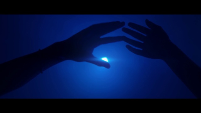 Video Reference: Blue, Light, Finger, Hand, Sky, Electric blue, Atmosphere, Photography, Backlighting, Gesture