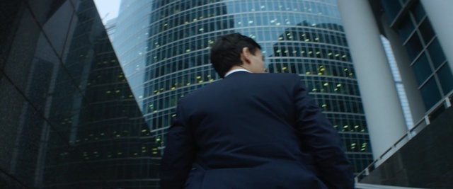 Video Reference: building, skyscraper, metropolis, white collar worker, gentleman, city, businessperson, sky, energy, suit, Person