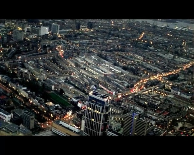 Video Reference: urban area, metropolitan area, city, cityscape, metropolis, aerial photography, bird eye view, sky, suburb, night, Person