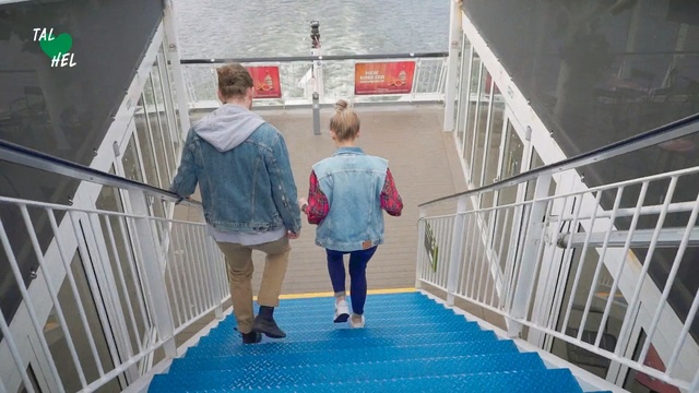 Video Reference: Handrail, Leisure, Stairs, Person, Fence, Building, Standing, Child, Bridge, Young, Boy, Girl, Walking, Small, Woman, Little, Holding, Playing, Water, Man, Pool, Umbrella, People, Suitcase, White, Blue, Room, Rain, Street, Luggage, Group, Clothing, Footwear, Floor, Jeans, Trousers