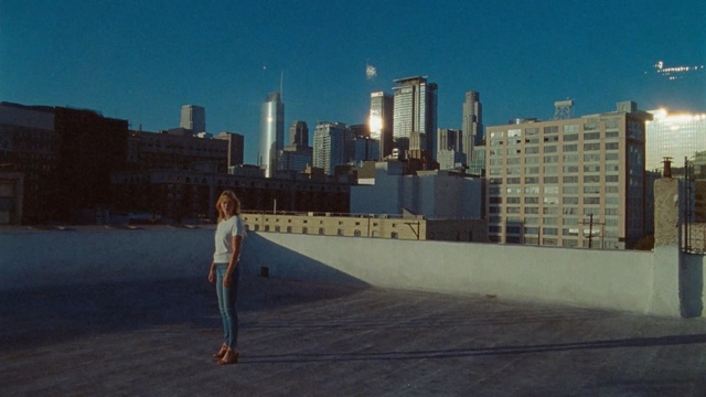 Video Reference: Skyline, Urban area, City, Daytime, Metropolitan area, Human settlement, Sky, Cityscape, Roof, Downtown