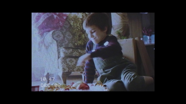 Video Reference: Photograph, Child, People, Facial expression, Toddler, Sitting, Portrait, Head, Violet, Snapshot