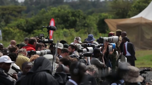 Video Reference: crowd, vehicle, tree, recreation, event, Person