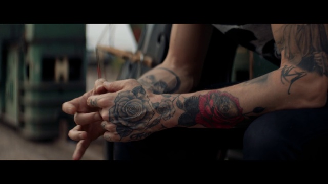Video Reference: Tattoo, Arm, Skin, Flesh, Joint, Human leg, Hand, Leg, Human body, Muscle