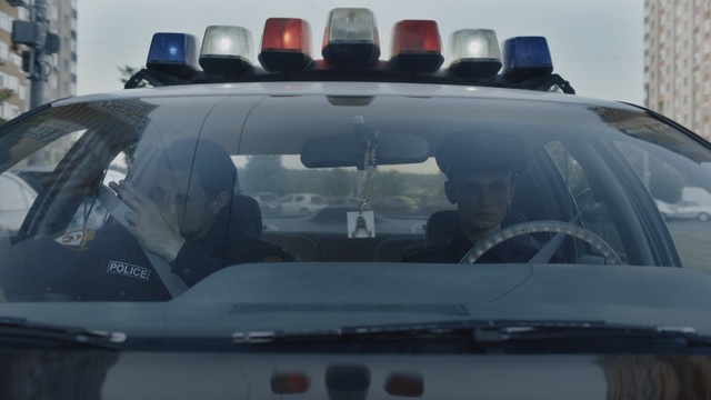 Video Reference: Automotive exterior, Windshield, Police car, Vehicle, Motor vehicle, Windscreen wiper, Glass, Auto part, Car, Automotive window part