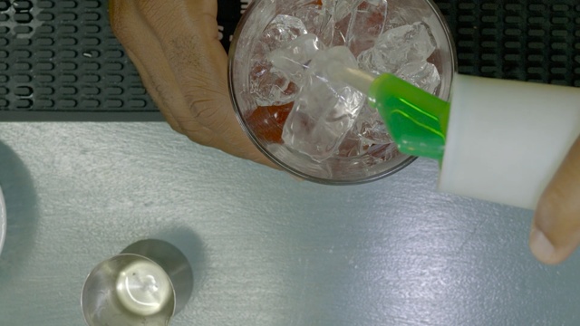 Video Reference: finger, hand, nail, plastic, material, drinkware, glass, Person