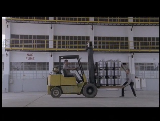 Video Reference: motor vehicle, forklift truck, mode of transport, structure, transport, vehicle, product, car, machine, Person