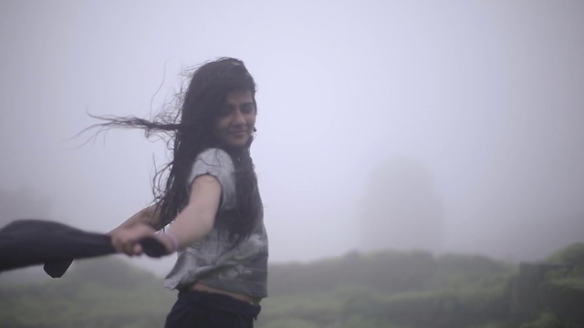Video Reference: White, Atmospheric phenomenon, Sky, Photography, Black hair, Fog, Shoulder, Cloud, Long hair, Mountain