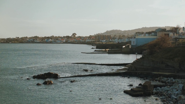 Video Reference: sea, body of water, coast, coastal and oceanic landforms, shore, water, sky, bay, vehicle, beach