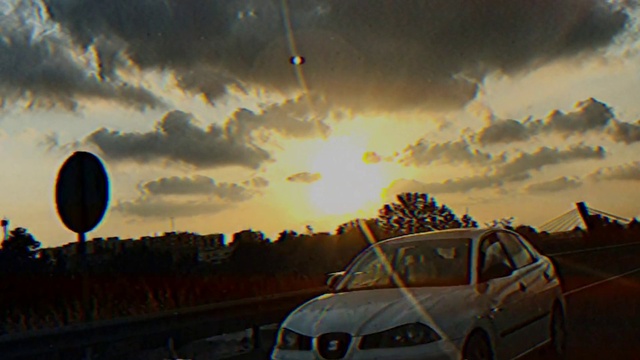 Video Reference: Cloud, Sky, Atmosphere, Plant, Automotive lighting, Hood, Vehicle, Car, Light, Tire