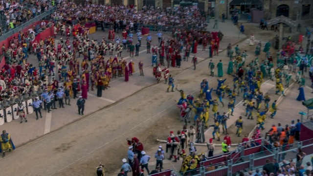 Video Reference: Crowd, Sport venue, People, Audience, Arena, Stadium, Public space, Fan, Competition event, Fun