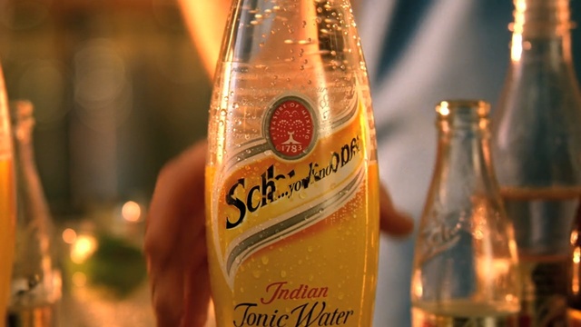 Video Reference: drink, liqueur, alcoholic beverage, bottle, distilled beverage, beer, alcohol, beer bottle, glass bottle, pint us, Person