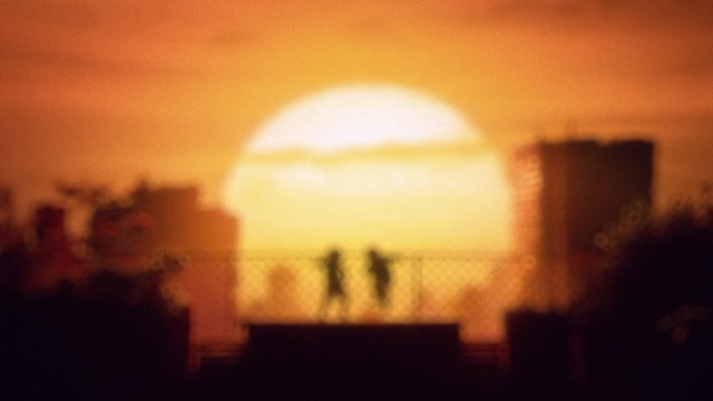 Video Reference: Sky, Sunrise, Afterglow, Sun, Orange, Sunset, Morning, Light, Heat, Evening, Front, Blurry, Man, Street, Fog, Cloud, Blur