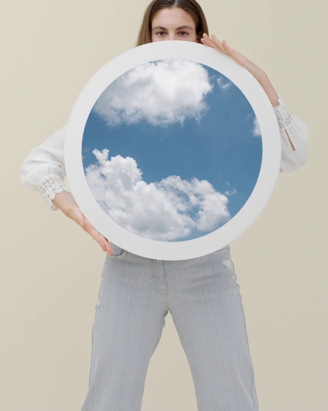 Video Reference: White, Blue, Shoulder, Sky, Standing, Cloud, Arm, Outerwear, Photography, Jeans