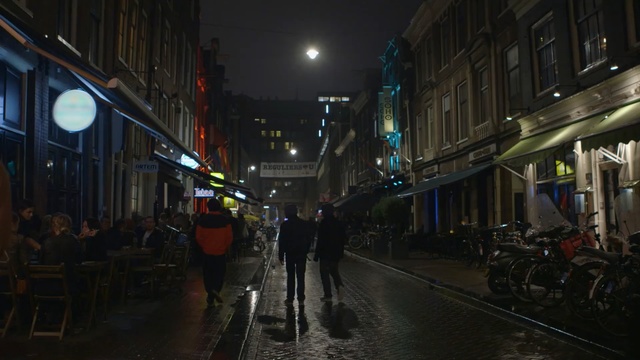Video Reference: night, street, city, urban area, town, light, road, darkness, metropolis, alley, Person