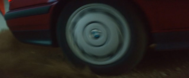 Video Reference: blue, mode of transport, wheel, car, automotive wheel system, tire, automotive tire, automotive design, motor vehicle, rim, Person