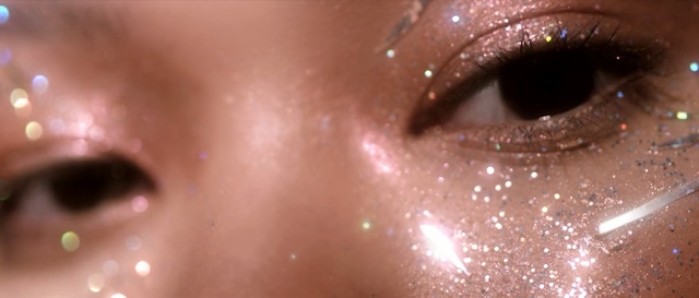 Video Reference: face, eyebrow, nose, eye, cheek, eyelash, close up, chin, lip, glitter