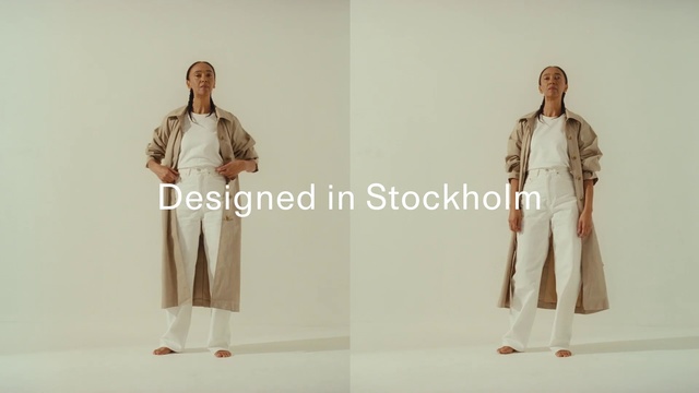 Video Reference: Clothing, Fashion, Standing, Fashion design, Outerwear, Sleeve, Trench coat, Costume design, Beige, Coat