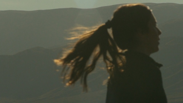 Video Reference: sky, girl, sunlight, sea, cloud, silhouette, mountain, landscape, Person