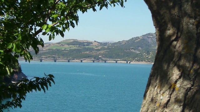 Video Reference: Body of water, Sea, Tree, Coast, Water, Bay, Coastal and oceanic landforms, Lake, Sky, Reservoir