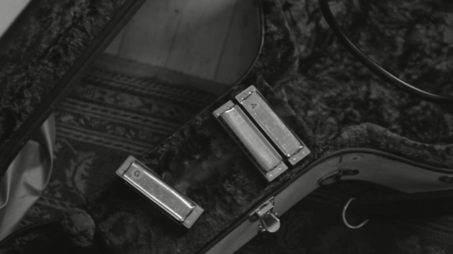 Video Reference: black, black and white, monochrome photography, photography, light, monochrome, darkness, musical instrument accessory, angle, product