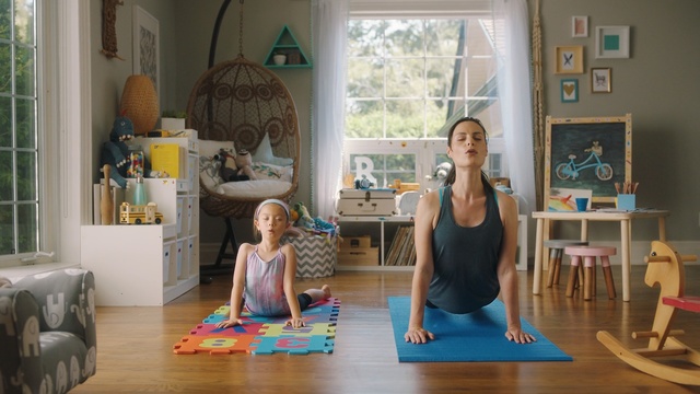 Video Reference: Physical fitness, Yoga, Room, Yoga mat, Floor, Flooring, Child, Interior design, Sitting, House, mother, Person