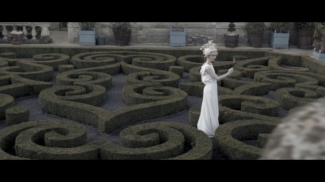Video Reference: stone carving, labyrinth, maze, outdoor structure, grass, screenshot, archaeological site, sculpture
