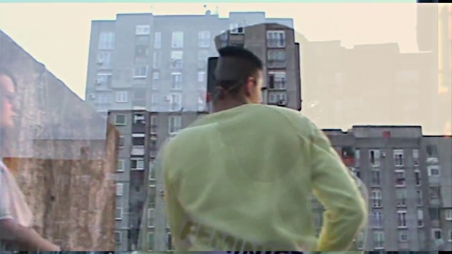 Video Reference: Urban area, Human settlement, City, Metropolitan area, Outerwear, Architecture, Residential area, Metropolis, Facade, Building