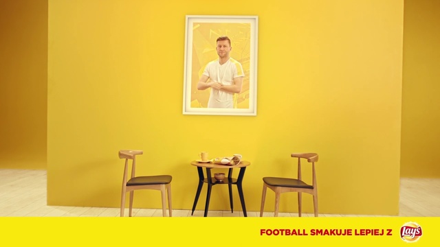 Video Reference: Yellow, Room, Table, Furniture, Sitting, Picture frame, Person