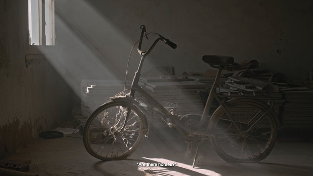 Video Reference: Bicycle wheel, Bicycle, Spoke, Bicycle part, Vehicle, Bicycle accessory, Bicycle saddle, Bicycle tire, Bicycle fork, Bicycle handlebar, Motorcycle, Parked, Sitting, Small, Side, Woman, Door, Black, White, Room, Table, Standing, Man, Sign, Clock, Street, Double, Wheel, Tire, Land vehicle, Wall, Bike, Sports equipment, Bicycle stem