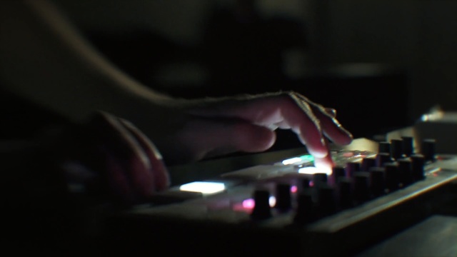 Video Reference: disc jockey, sound, darkness, musical keyboard, electronic instrument, electronic device, musical instrument accessory, keyboard, technology, audio