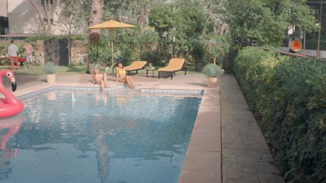 Video Reference: swimming pool, property, leisure, water, resort, backyard, estate, water feature, outdoor structure, recreation