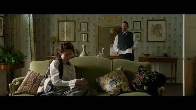 Video Reference: Living room, Photograph, Couch, Facial expression, People, Room, Interior design, Furniture, Sitting, Snapshot