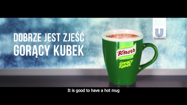 Video Reference: Cup, Green, Cup, Drink, Product, Text, Morning, Coffee cup, Font, Drinkware, Person