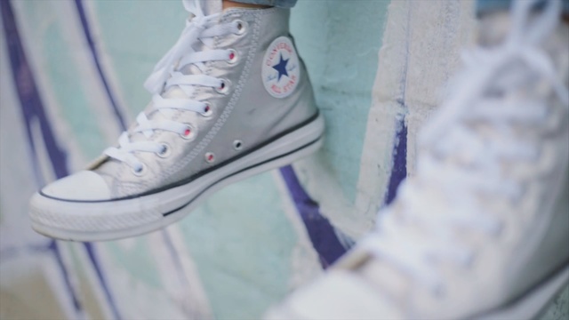 Video Reference: footwear, blue, white, sneakers, shoe, product, cool, sportswear, product, outdoor shoe, Person