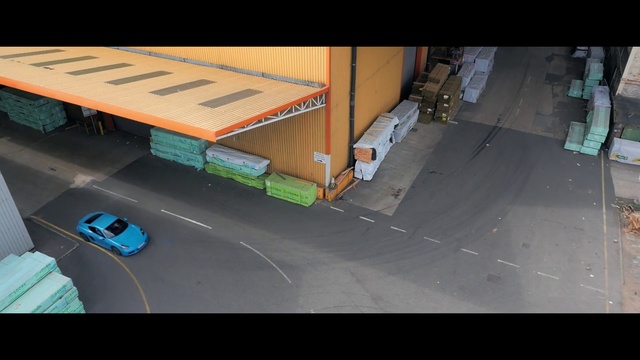 Video Reference: Asphalt, Mode of transport, Transport, Automotive exterior, Vehicle, Table, Road, Road surface, City, Furniture