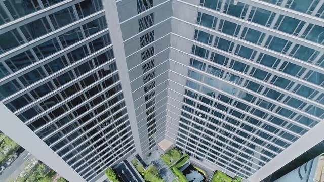 Video Reference: Metropolitan area, Tower block, Condominium, Commercial building, Property, Building, Architecture, Urban area, Skyscraper, Mixed-use
